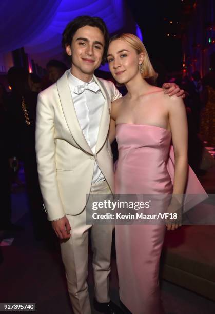 Timothee Chalamet and Saoirse Ronan attend the 2018 Vanity Fair Oscar Party hosted by Radhika Jones at Wallis Annenberg Center for the Performing...