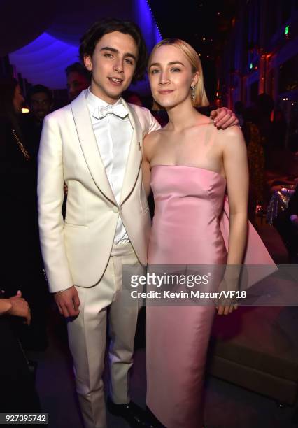 Timothee Chalamet and Saoirse Ronan attend the 2018 Vanity Fair Oscar Party hosted by Radhika Jones at Wallis Annenberg Center for the Performing...