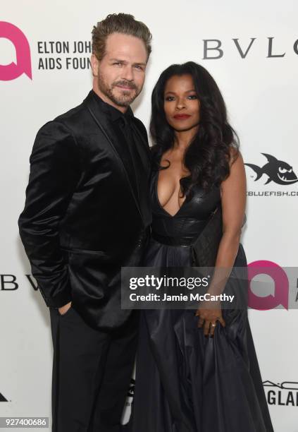 Bradford Sharp and Keesha Sharp attends the 26th annual Elton John AIDS Foundation Academy Awards Viewing Party sponsored by Bulgari, celebrating...