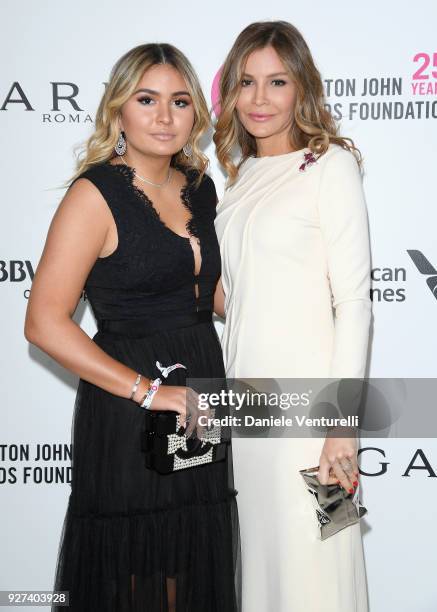 Guest and Lola Karimova-Tillyaeva attend Elton John AIDS Foundation 26th Annual Academy Awards Viewing Party at The City of West Hollywood Park on...