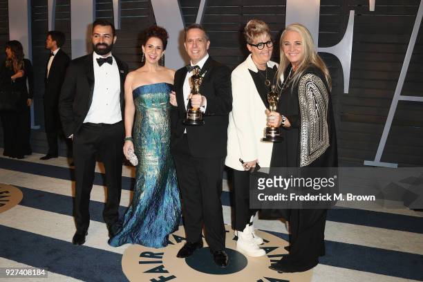 Adrian Molina, Laura Century, Lee Unkrich, Kori Rae and Darla K. Anderson attend the 2018 Vanity Fair Oscar Party hosted by Radhika Jones at Wallis...