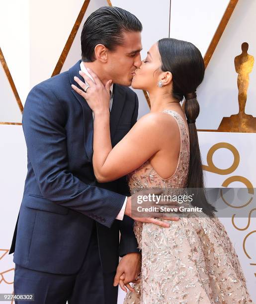 Gina Rodriguez, Joe LoCicero arrives at the 90th Annual Academy Awards at Hollywood & Highland Center on March 4, 2018 in Hollywood, California.