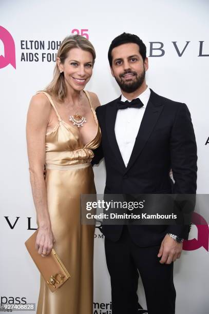 Sarah Gargano and Maz Zouhairi attend the 26th annual Elton John AIDS Foundation Academy Awards Viewing Party sponsored by Bulgari, celebrating EJAF...