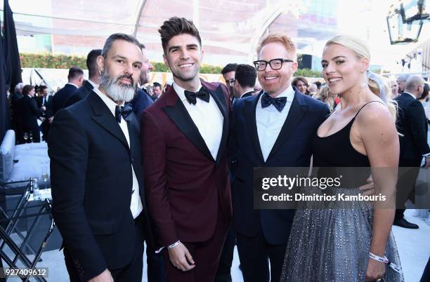 Marc Silverstein, Justin Mikita, Jesse Tyler Ferguson, and Busy Philipps attend the 26th annual Elton John AIDS Foundation Academy Awards Viewing...