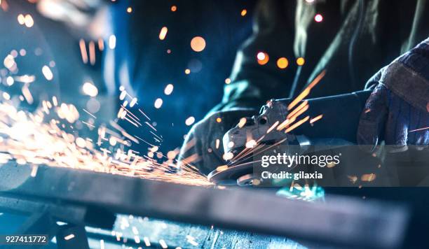 steel processing plant. - blue glove stock pictures, royalty-free photos & images