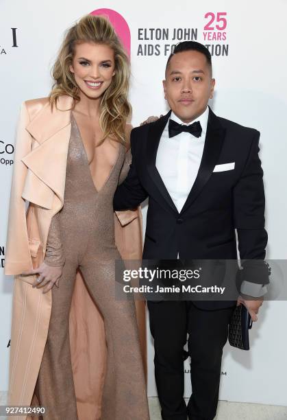 AnnaLynne McCord and Rembrandt Flores attend the 26th annual Elton John AIDS Foundation Academy Awards Viewing Party sponsored by Bulgari,...