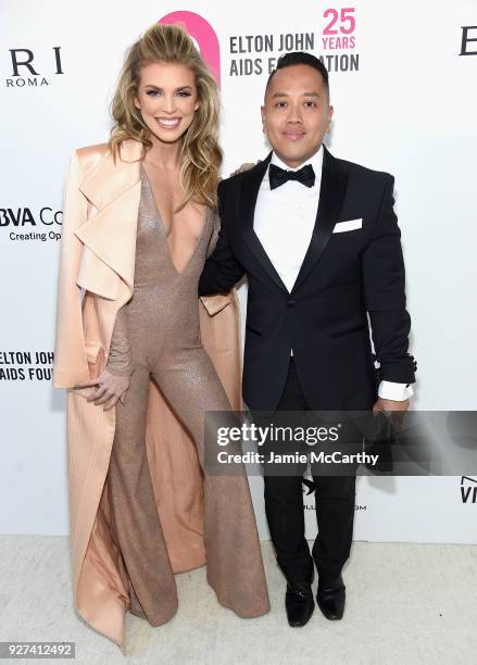 AnnaLynne McCord and Rembrandt Flores attend the 26th annual Elton John AIDS Foundation Academy Awards Viewing Party sponsored by Bulgari,...