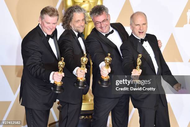 John Nelson, Paul Lambert, Richard R. Hoover and Gerd Nefzer attend the 90th Annual Academy Awards - Press Room on March 4, 2018 in Hollywood,...