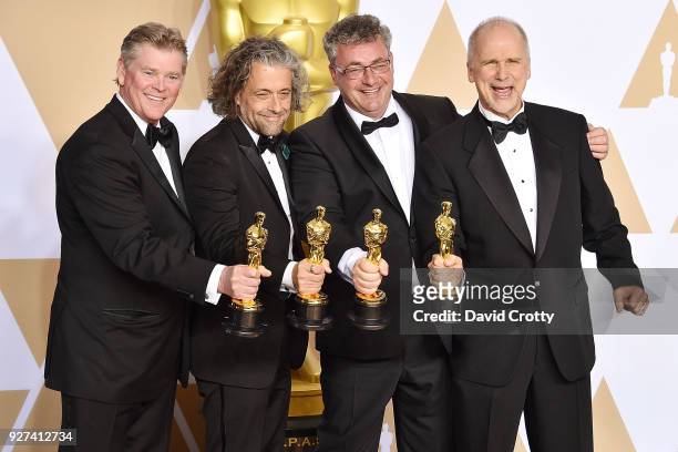 John Nelson, Paul Lambert, Richard R. Hoover and Gerd Nefzer attend the 90th Annual Academy Awards - Press Room on March 4, 2018 in Hollywood,...