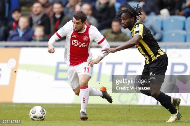 Amin Younes of Ajax, Fankaty Dabo of Vitesse during the Dutch Eredivisie match between Vitesse Arnhem and Ajax Amsterdam at Gelredome on March 04,...