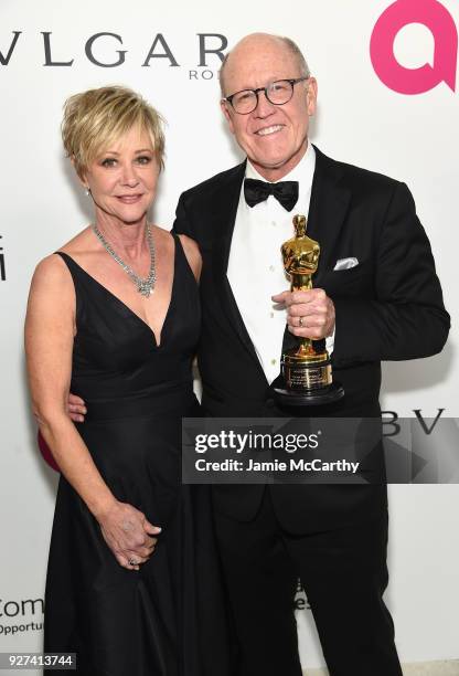 Glen Keane, winner of Best Animated Short Film, and guest attend the 26th annual Elton John AIDS Foundation Academy Awards Viewing Party sponsored by...