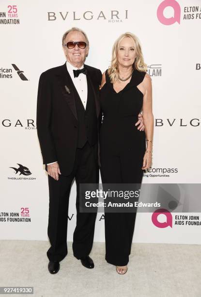 Peter Fonda Parky Devogelaere arrive at the 26th Annual Elton John AIDS Foundation's Academy Awards Viewing Party on March 4, 2018 in West Hollywood,...