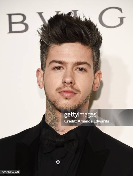 Actor Travis Mills arrives at the 26th Annual Elton John AIDS Foundation's Academy Awards Viewing Party on March 4, 2018 in West Hollywood,...