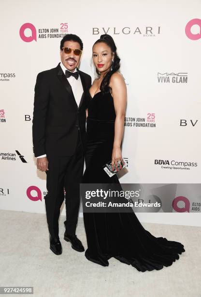 Lionel Richie and Lisa Parigi arrive at the 26th Annual Elton John AIDS Foundation's Academy Awards Viewing Party on March 4, 2018 in West Hollywood,...