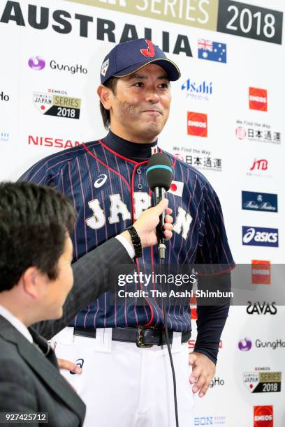 Head coach Atsunori Inaba of Japan is interviewed after his side's 6-0 victory in the game two of the baseball international match between Japan and...