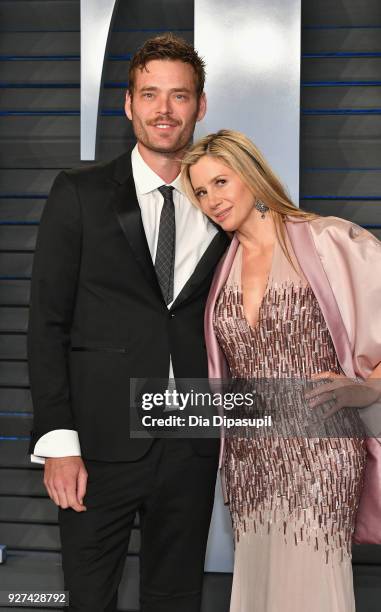 Christopher Backus and Mira Sorvino attend the 2018 Vanity Fair Oscar Party hosted by Radhika Jones at Wallis Annenberg Center for the Performing...