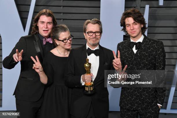 Gulliver Oldman, Gisele Schmidt, actor Gary Oldman and Charlie Oldman attend the 2018 Vanity Fair Oscar Party hosted by Radhika Jones at Wallis...