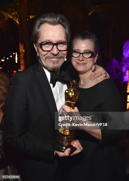 Gary Oldman and Gisele Schmidt attends the 2018 Vanity Fair Oscar Party hosted by Radhika Jones at Wallis Annenberg Center for the Performing Arts on...