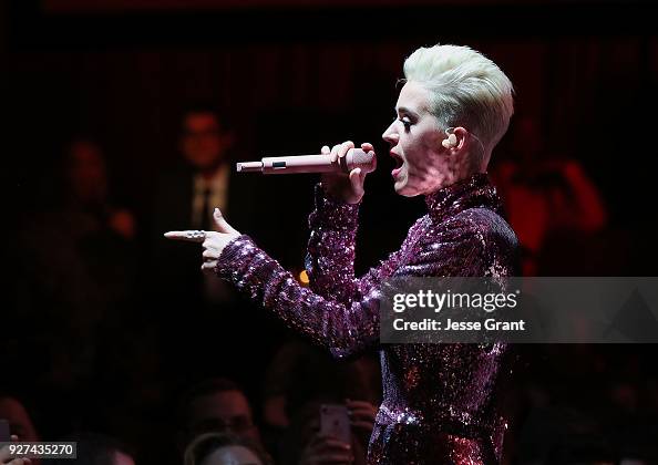 Katy Perry performs during Byron Allen's Oscar Gala Viewing Party to
