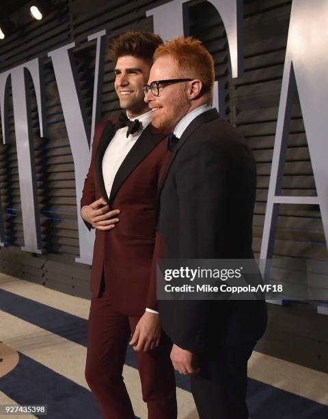 Justin Mikita and Jesse Tyler Ferguson attend the 2018 Vanity Fair Oscar Party hosted by Radhika Jones at Wallis Annenberg Center for the Performing...