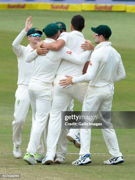 Josh Hazlewood of Australia celebrates the wicket of Quinton de Kock of the Proteas during day 5 of the 1st Sunfoil Test match between South Africa...