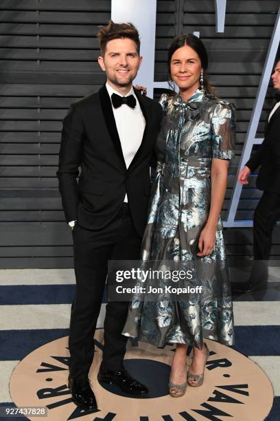 Adam Scott and Naomi Scott attend the 2018 Vanity Fair Oscar Party hosted by Radhika Jones at Wallis Annenberg Center for the Performing Arts on...