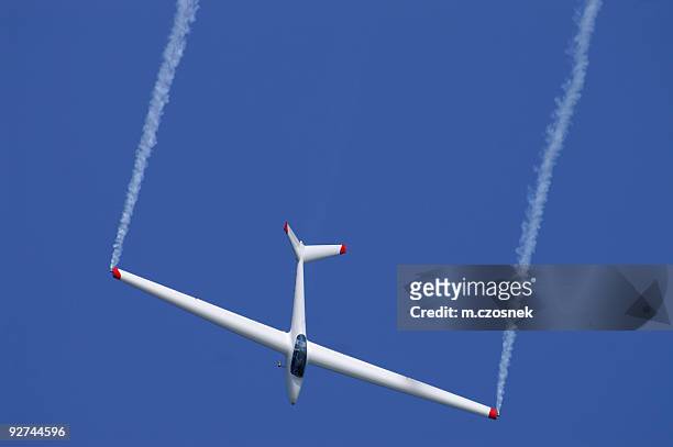 glider - aerobatics stock pictures, royalty-free photos & images