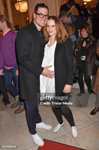 Tobias Licht and Nora Huetz attend the 'Die Niere' premiere on March 4, 2018 in Berlin, Germany.