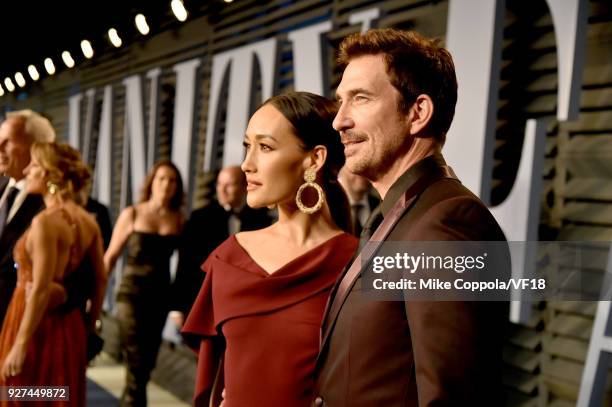 Maggie Q and Dylan McDermott attend the 2018 Vanity Fair Oscar Party hosted by Radhika Jones at Wallis Annenberg Center for the Performing Arts on...