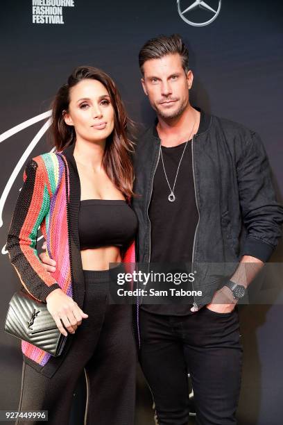 Snezana Markoski and Sam Wood arrives ahead of the VAMFF 2018 Gala Runway presented by David Jones on March 5, 2018 in Melbourne, Australia.