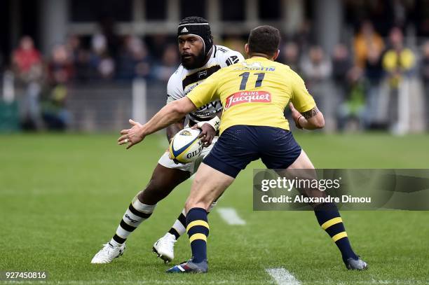 Levani Botia of La Rochelle and Remy Grosso of Clermont during the French Top 14 match between Clermont and La Rochelle at Stade Marcel Michelin on...