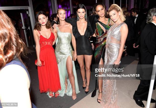 Phoebe Tonkin, Rosie Huntington-Whiteley, Kendall Jenner, Joan Smalls and Hailey Baldwin attend the 2018 Vanity Fair Oscar Party hosted by Radhika...