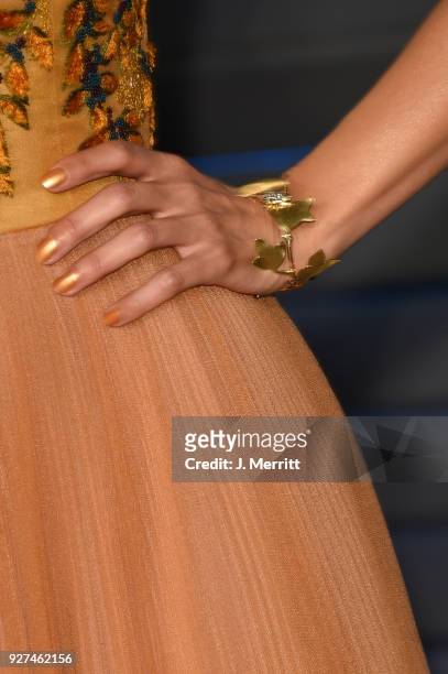 Actress Emmanuelle Chriqui, jewelry detail, attends the 2018 Vanity Fair Oscar Party hosted by Radhika Jones at the Wallis Annenberg Center for the...