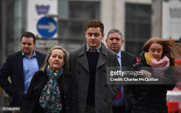 Paddy Jackson arrives at Belfast Laganside courts along with family members on March 5, 2018 in Belfast, Northern Ireland. The Ireland and Ulster...