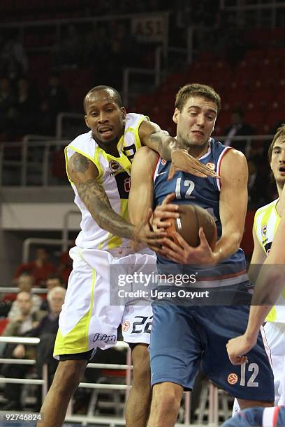 Luksa Andric, #12 of Cibona competes with and Tarence Kinsey # of Fenerbahce Ulker during the Euroleague Basketball Regular Season 2009-2010 Game Day...