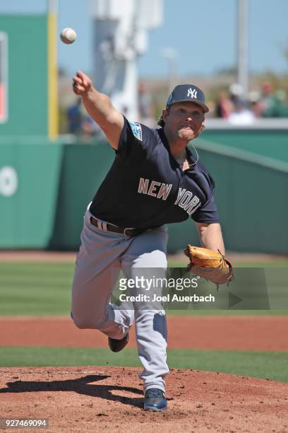 Chance Adams of the New York Yankees throws the ball against the Boston Red Sox during a spring training game at JetBlue Park on March 3, 2018 in...