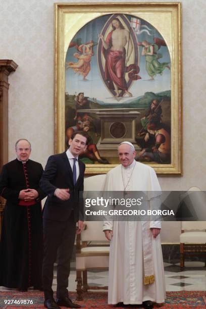 Pope Francis poses with Austrian Chancellor Sebastian Kurz during a private audience at the Vatican on March 5, 2018. / AFP PHOTO / POOL / Gregorio...