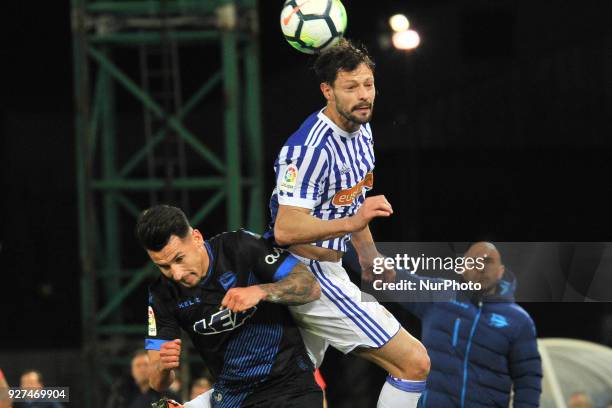 De la Bella of Real Sociedad duels for the ball with Hernan Perez of Alaves during the Spanish league football match between Real Sociedad and Alaves...
