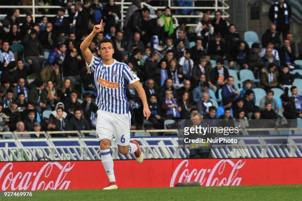 Hector Moreno of Real Sociedad celebrates with teammates after scoring during the Spanish league football match between Real Sociedad and Alaves at...