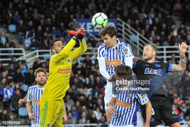 Miguel Angel Moya, Jon Bautista and Diego Llorente of Real Sociedad during the Spanish league football match between Real Sociedad and Alaves at the...