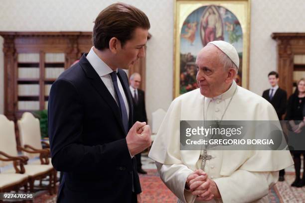Pope Francis talks with Austrian Chancellor Sebastian Kurz during a private audience at the Vatican,on March 5, 2018. / AFP PHOTO / POOL / Gregorio...