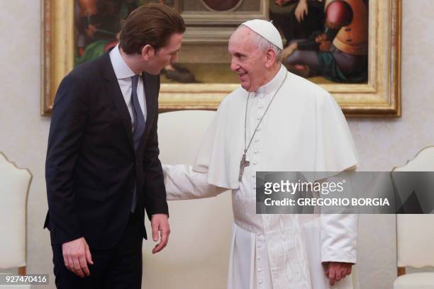 Pope Francis talks with Austrian Chancellor Sebastian Kurz during a private audience at the Vatican,on March 5, 2018. / AFP PHOTO / POOL / Gregorio...