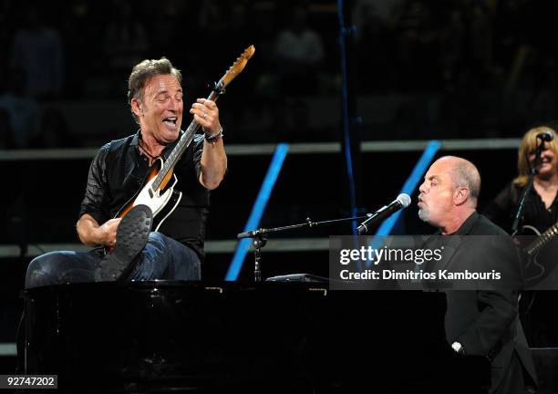 Bruce Springsteen and Billy Joel performs onstage at the 25th Anniversary Rock & Roll Hall of Fame Concert at Madison Square Garden on October 29,...