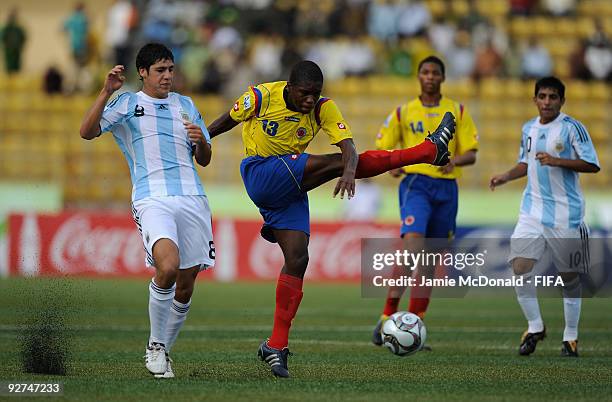 Deiner Cordoba of Colombia miss kicks the ball during the Round of 16 match between Argentina and Colombia at the Gateway International Stadium on...