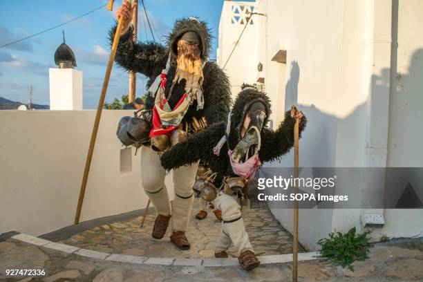 The "Old Men" walk uphill to the St. George Monastery which stands above the old town . He Old Man is the main figure of the Carnival celebration in...