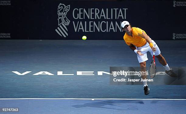 Fernando Verdasco of Spain serves the ball in his first round match against his fellow countryman Oscar Hernandez during the ATP 500 World Tour...