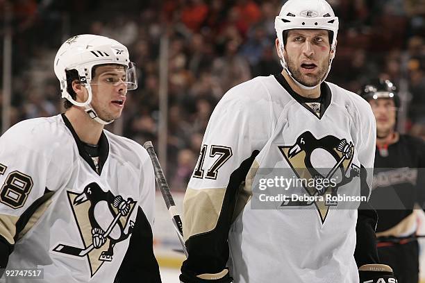 Eric Godard and Mike Rupp of the Pittsburgh Penguins skates on the ice against the Anaheim Ducks during the game on November 3, 2009 at Honda Center...