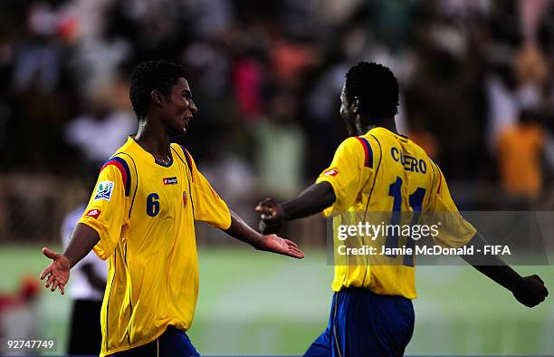 Estaban Espindola of Colombia celebrates scoring the winning goal with team mate Wilson Cuero during the Round of 16 match between Argentina and...