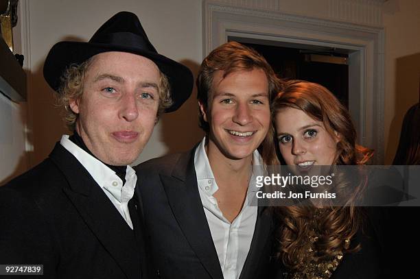 James Brown, David Clark and HRH Princess Beatrice of York attend the Georgina Chapman for Garrard collection launch on November 4, 2009 in London,...