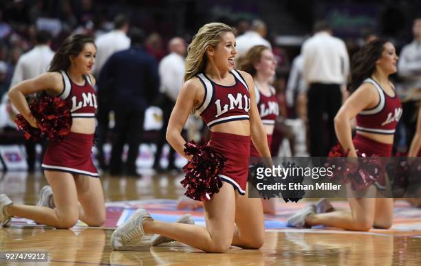 Loyola Marymount Lions cheerleaders perform during the team's quarterfinal game of the West Coast Conference basketball tournament against the...